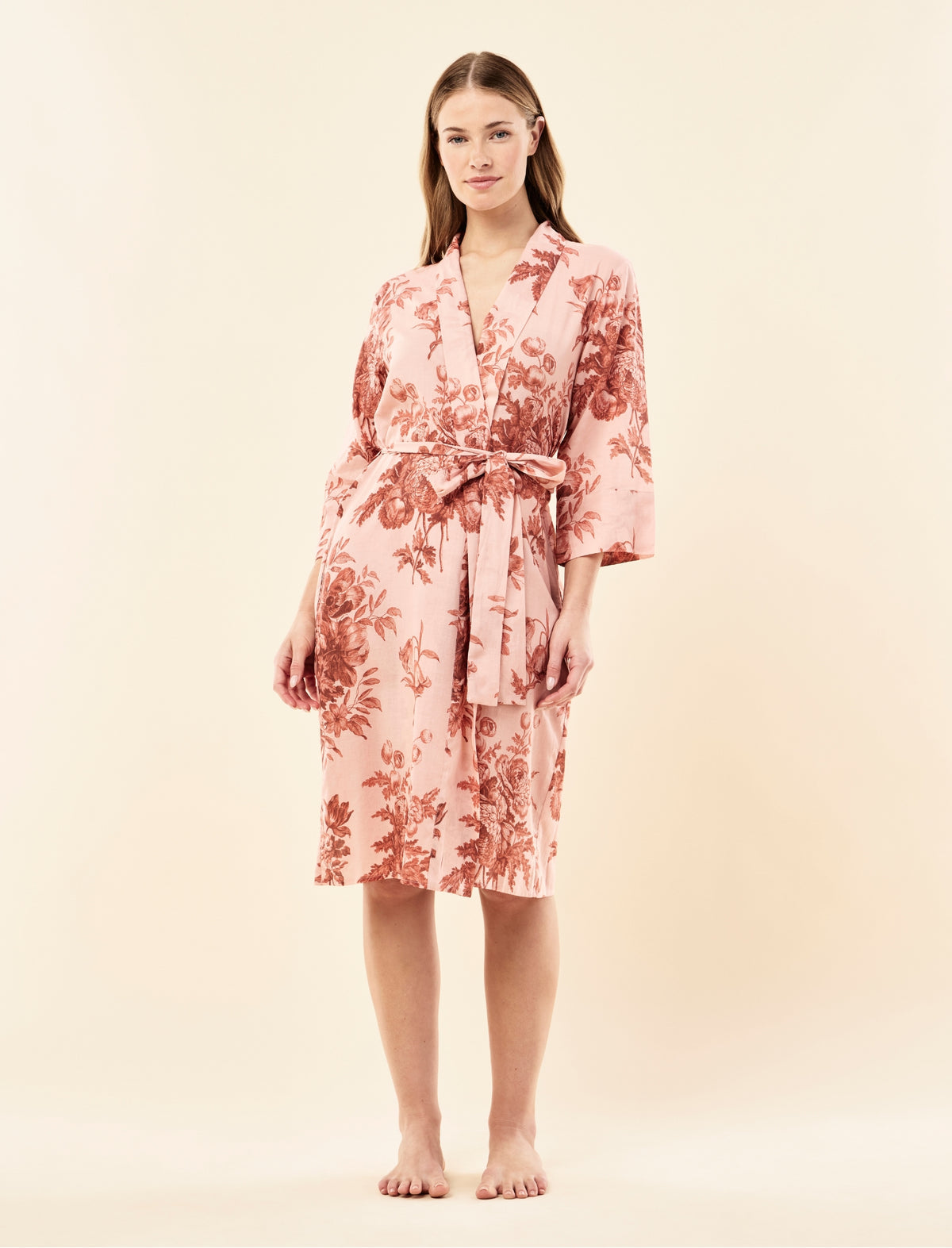 Sianie wearing the Karen Walker Romantic Floral Midi Robe