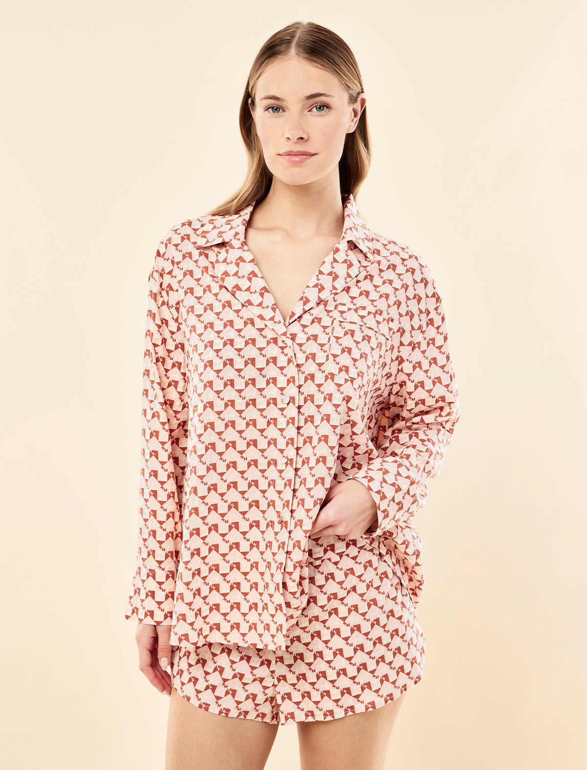 Sianie wearing the Karen Walker Monogram Tiles Long Sleeve Boxer PJ Set