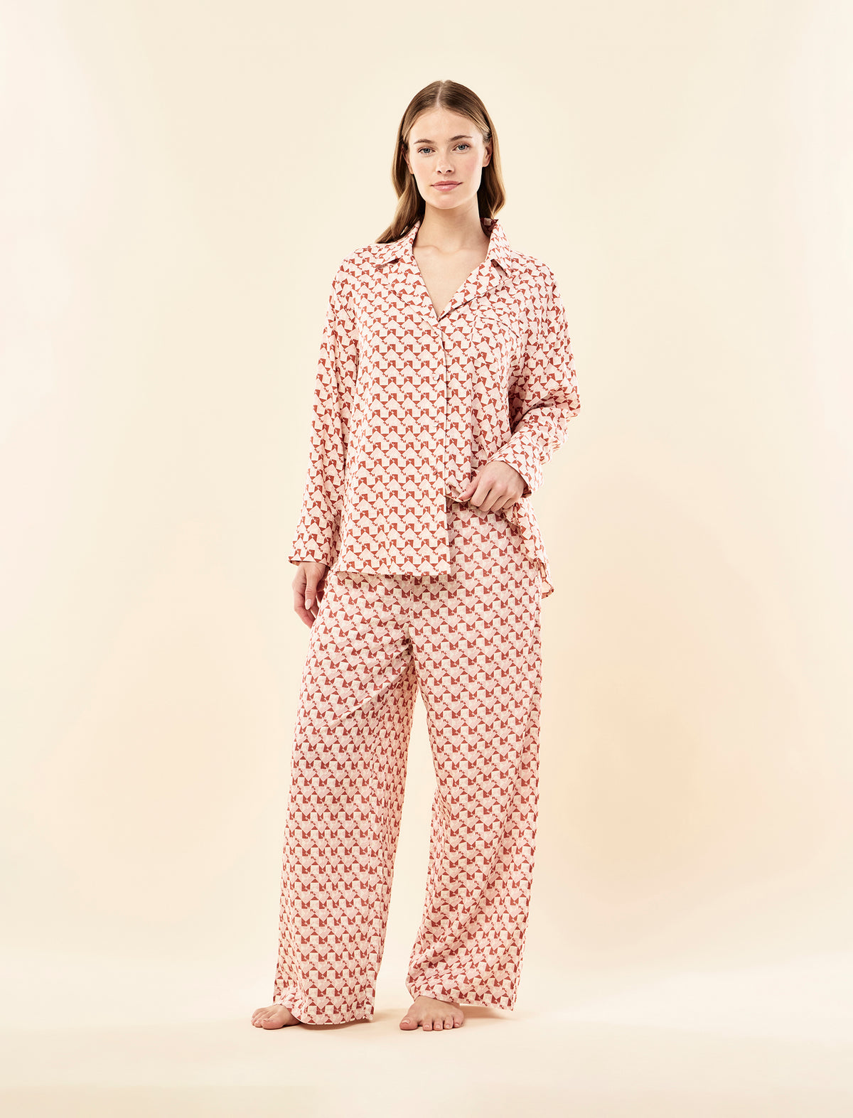 Sianie wearing the Karen Walker Monogram Tiles Relaxed Full Length PJ Set