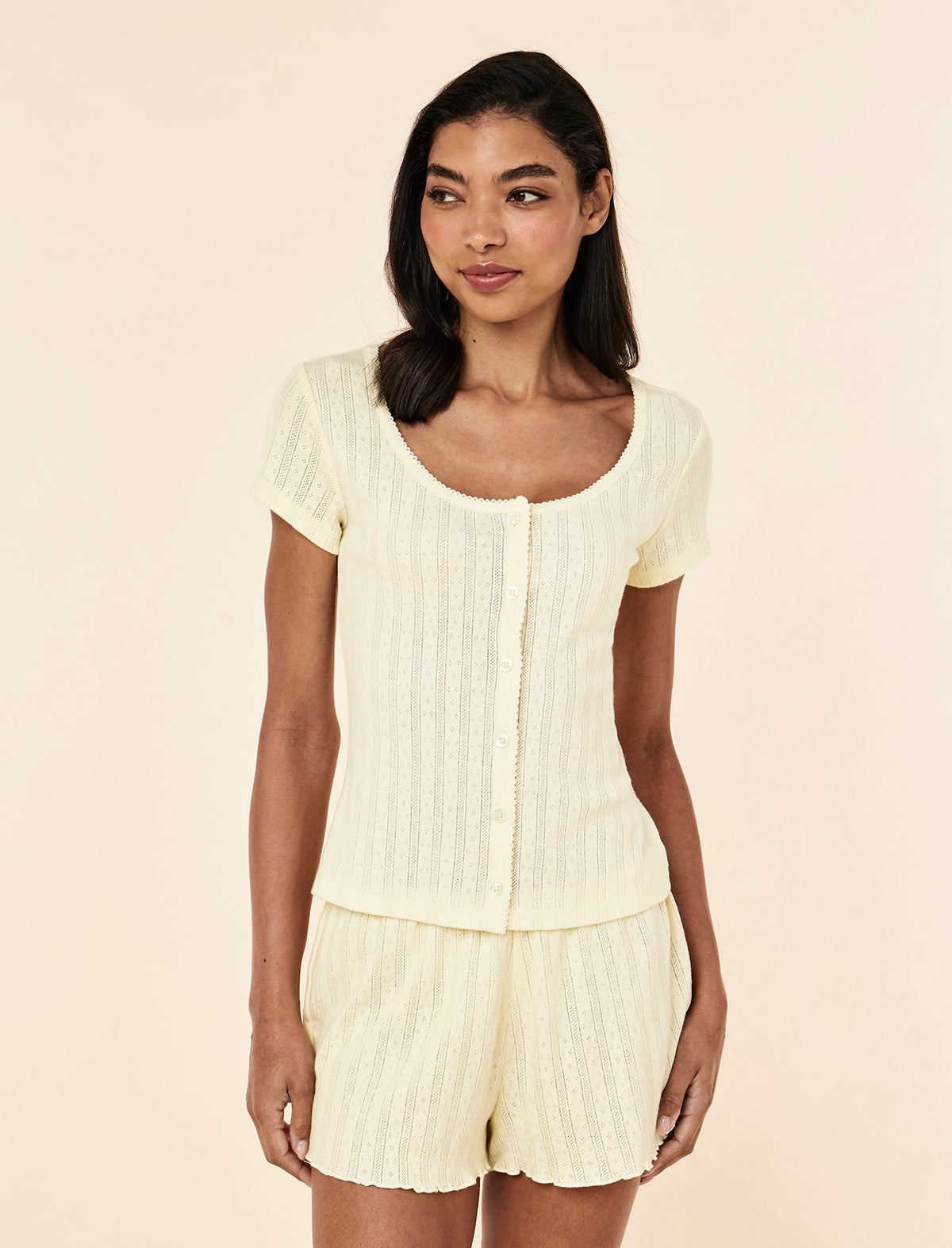 Cece wearing the Imogen Pointelle Tee
[model: Cece wears size S |  Height: 178cm
/ 5’10” | Bust: 76cm | Waist: 61cm | Hips: 89cm]