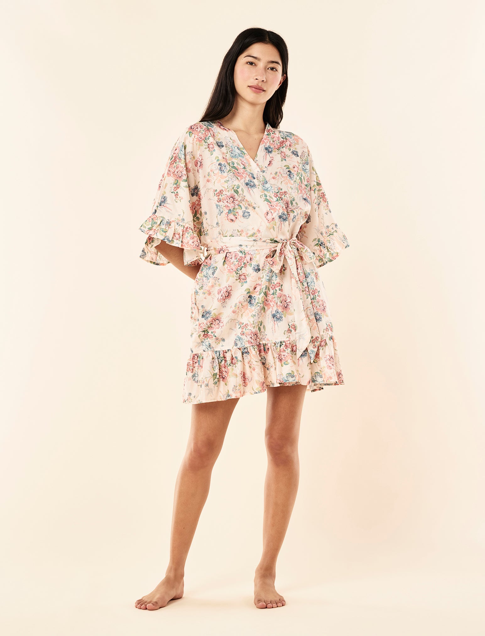 Zoey wearing the Elise Midi Frill Robe
[model: Zoey wears size XS |  Height: 172cm/ 5’7” | Bust: 80cm | Waist: 62cm | Hips: 89.5cm]