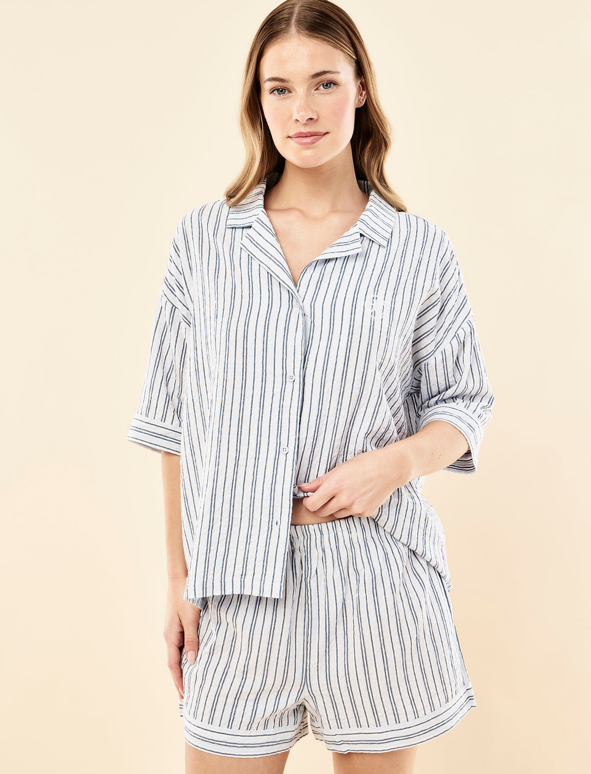 Sianie wearing the Karen Walker Seersucker Stripe Boxer PJ Set
[model: Sianie wears size S |  Height: 175m
/ 5’9” | Bust: 85cm | Waist: 66cm| Hips: 93cm]